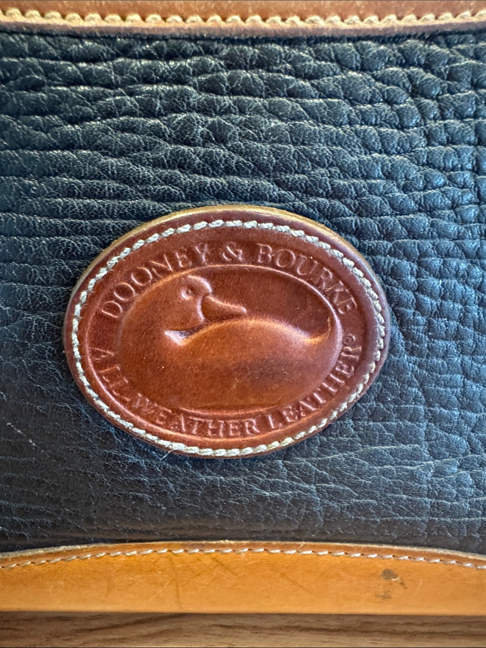 Dooney & Bourke Black Pebbled Leather Shoulder Bag with Brown Trim